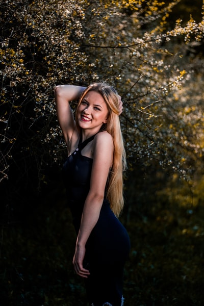 Woman standing near a smile
